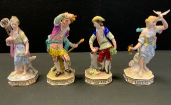 A set of four Royal Crown Derby figures representing the Elements; Fire, Water, Earth, each