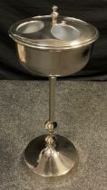A polished or chromed metal four bottle wine cooler, bulbous column, circular foot, 83cm high, 35.