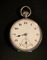 An early 20th century silver open faced pocket watch, import mark for Birmingham 1918