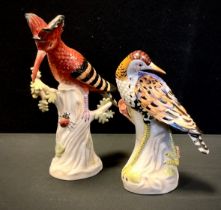 A pair of contemporary Sevres style porcelain figures, as Hoopoe bird and insect, and wading bird,