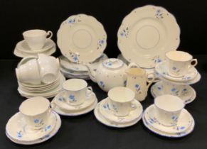 A blue Victoria tea set for six; including a tea pot, six tea cups and saucers, four medium sized