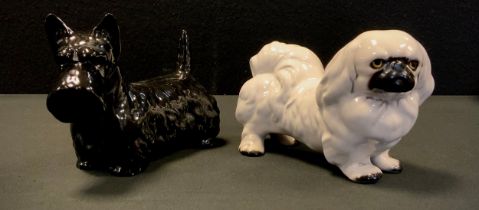 A Beswick model, West Highland Terrier, black gloss, printed marks, another Pekinese , white