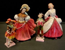 A Royal Doulton figure, Pearly Boy Hn 2035 and Pearly Girl, Hn 2026 , others, The Skater, Hn2117,
