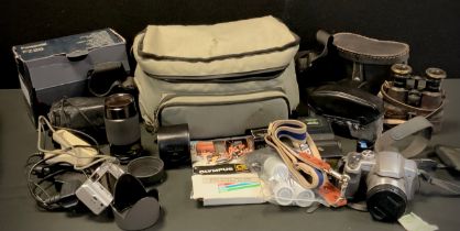 An Olympus OM10 SLR camera body, 70-210mm zoom lens, others, filters, flash etc, Lumix Digital