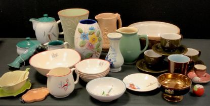 Mid century ceramics including; Denby Green wheat ware, three dark green tea cups and saucers,