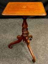 A Victorian mahogany tripod table, rounded rectangular top with 'White Star Line' inspired marquetry