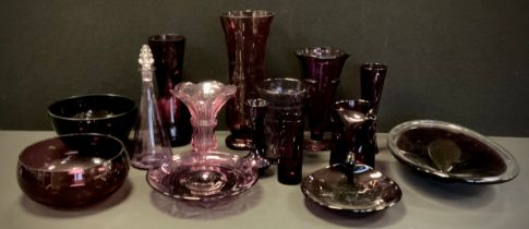 A quantity of Amethyst glass including; vases 19cm-36cm, oval dish, 36cm dia, decanter, bowl, ;