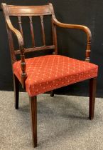 A Regency mahogany armchair, 85.5cm high x 54cm wide x 48cm deep.