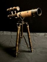 A reproduction miniature Kelvin & Hughes monocular telescope on tripod stand, 26cm long.
