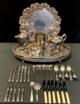 A silver plated salver, oval tray, three piece tea set, white metal hafted flatware etc