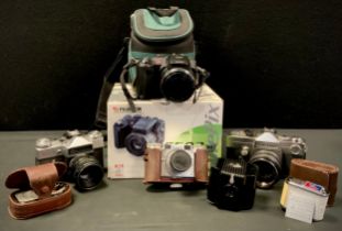 Cameras and camera equipment - a Fujifilm S602 pro zoom digital camera, boxed; Zenit-E 35mm SLR