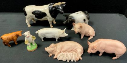 Ceramic animals including Beswick pig, 17cm long, a set of three Aynsley pigs ,Beswick calf; etc