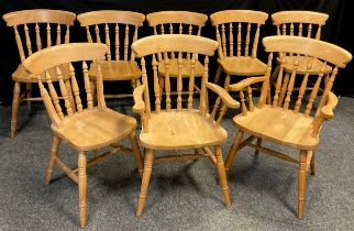 A set of eight beech spindle-back chairs, comprised is six chairs, and two carver chairs, (8).