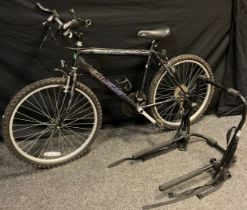 An Emmelle Cheetah mountain bike, 18 gears, black frame, 58cm (23 inch) wheels, with car mounting