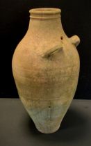 After the Antique, a large terracotta amphora, ring neck, twin looping handles to one side, 66cm