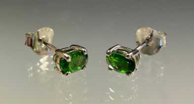 A pair of Chrome diopside and silver stud earrings.