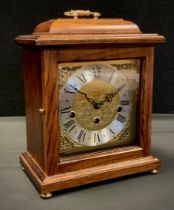 A Franz Hermle 8-day mantel clock, oak case, chiming movement.