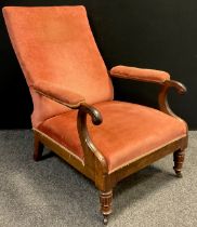 A 19th century walnut armchair, upholstered back, arms, and seat, carved legs, brass casters, 94cm