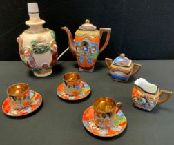 A Chinese export ware part tea service, Satsuma style lamp.