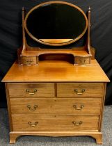 A Regency style reproduction mahogany dressing chest, 157.5cm high x 107cm wide x 53.5cm deep,