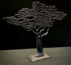 A large cast metal tree of life table lamp, 75cm high, 82cm wide