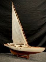 A wooden single mast Yacht, white hull, approx 115cm x 92cm