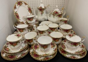 A Royal Albert 'Old Country Roses pattern' tea service for ten including, tea pot, coffee pot, ten