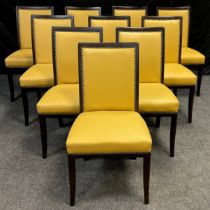 A set of ten dining chairs, faux-leather upholstered backs and seats, sprung seats, 90.5cm high x