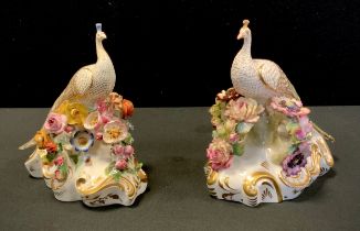 A Robert Bloor model gilded peacock, encrusted derby posies on scroll plinth,17cm,c.1830 ; another
