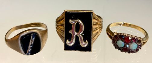 A 9ct gold signet ring, Letter R on black ground; another smaller 7.6g gross, 18ct gold opal and
