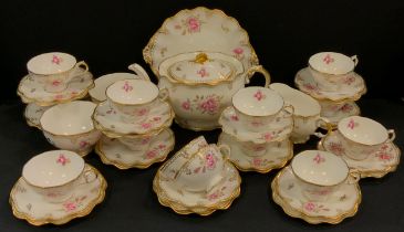 A Royal Crown Derby Pinxton Roses pattern tea set, for twelve inc teapot, bread/cake plate, cups,