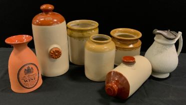 A group of stoneware vessels, one labelled Glasgow,15cm high, pewter mounted jug, hot water bottles;