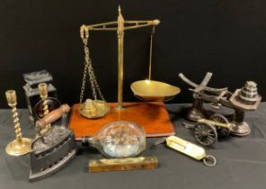 A pair of brass twist stemmed candlesticks,20cm high, bike lamp, weighing scales; etc
