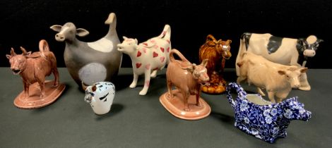 A 19th century cow creamer, others similar; Beswick cow, 19cm; etc (9)