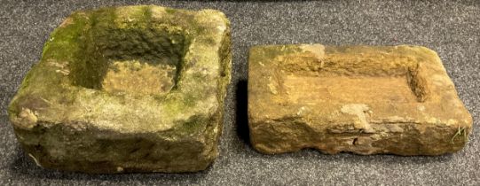 A small Derbyshire gritstone trough, 17cm high x 34cm x 31cm; another, smaller trough, (2).