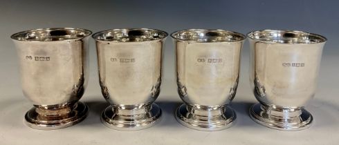 A set of four Elizabeth II silver egg cups, William Suckling Ltd, Birmingham 1961, 153.4g gross (4)