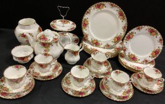 A Royal Albert ‘ Old Country roses’ table service for six including; six dinners plates, six smaller