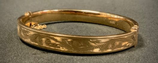 A 9ct gold hollow hinged bangle, 13g