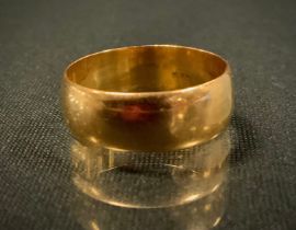 A 22ct gold wedding band, size p, 5.2g