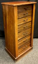 An Edwardian mahogany Wellington chest, seven graduated short drawers, 106cm high x 51.5cm wide x