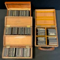 four boxes of photographic, hand coloured and other Magic lantern slides, approx 300, inc