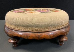 A 19th century walnut, tapestry upholstered footstool, 16.5cm high x 37cm x 28cm.