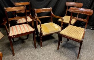 A pair of Regency walnut chairs, drop-in seats, sabre legs; a 19th century walnut armchair, pair