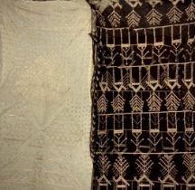 An Egyptian Assuit silver and black shawl, traditional motifs and geometric silver scales, approx