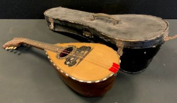 A Neapolitan bow back mandolin, labelled Fili Ferrari & Co, 60cm long, cased