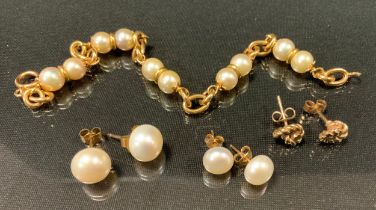 A cultured pearl and yellow metal bracelet, indistinctly marked,10.3g gross; pair of 9ct gold