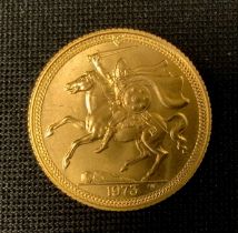 An Elizabeth II half sovereign, 1973, Isle of Man issue, the reverse shows a Norse warrior on