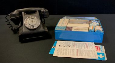 A Johnson & Johnson Dixcel first aid kit, with all original contents; a vintage black Bakelite