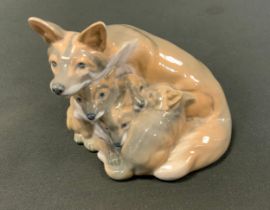 A Royal Copenhagen figure group of mother and pups, mark to base, 10cm high