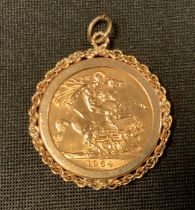 An Elizabeth II sovereign, 9ct pendant mount, 1964, London mint, 9.6g gross